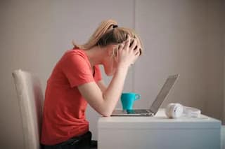 Stressed person thinking about money